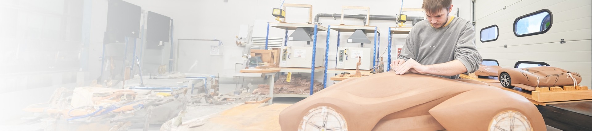 Automotive student working on a project