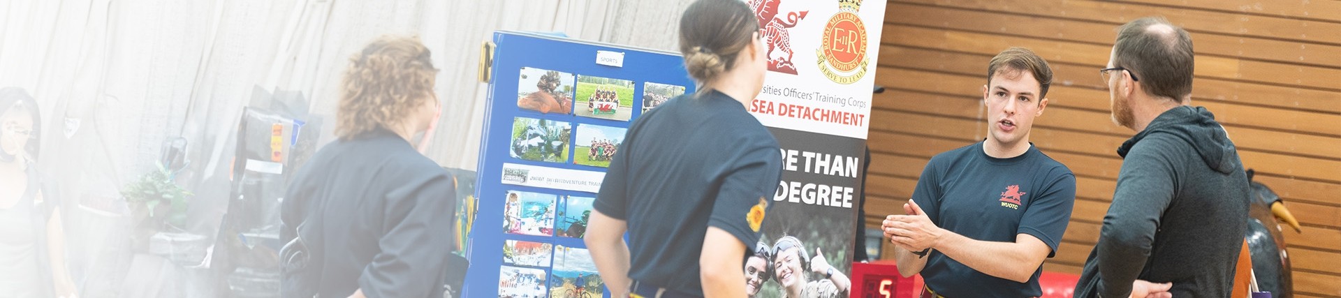 Armed forces representative at a recruitment fair