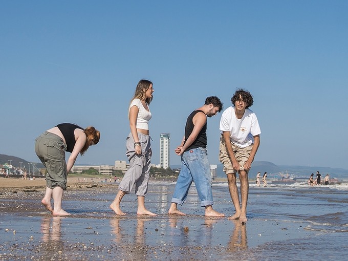 Students having fun on the beach
