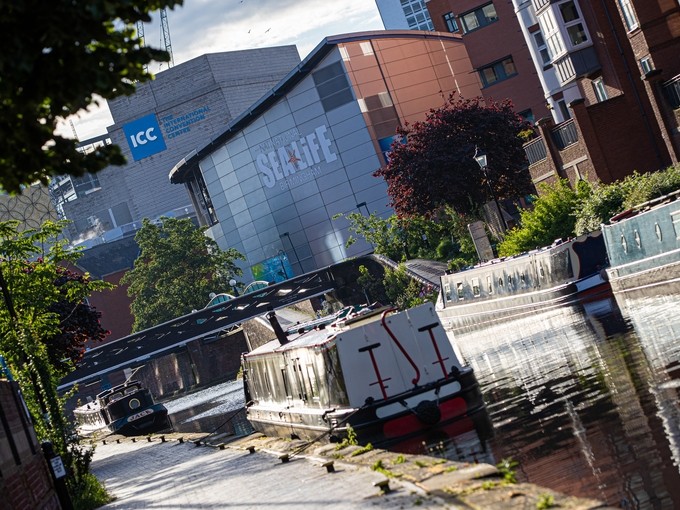 Canal boats with the International Convention Centre in the background