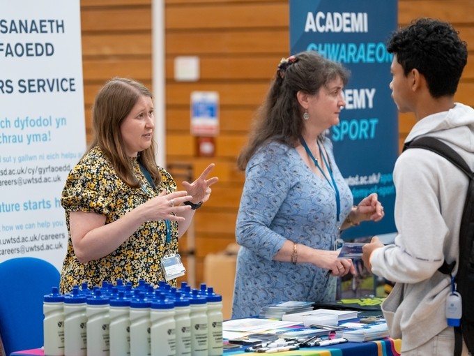 Staff members at a careers fair