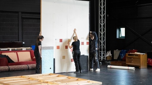 Students building a stage set