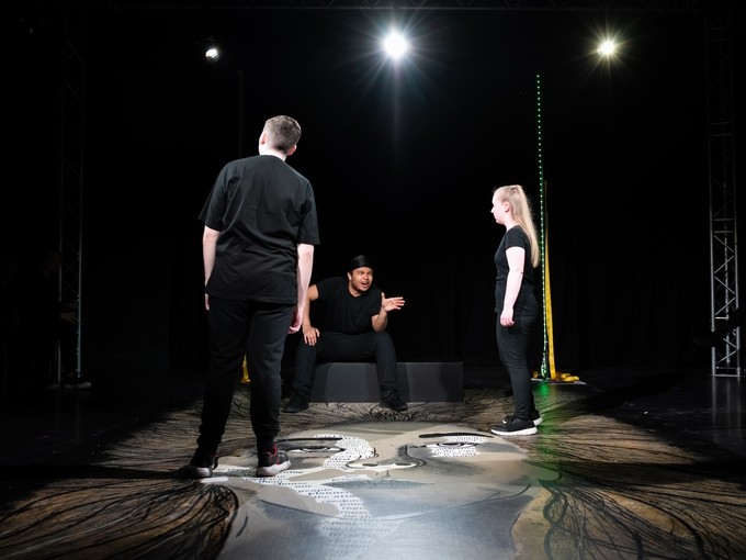 Students performing on stage