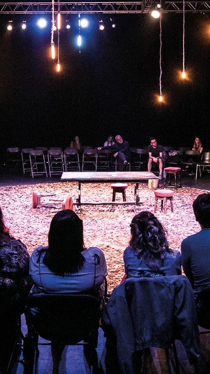 Group of people performing in a circle