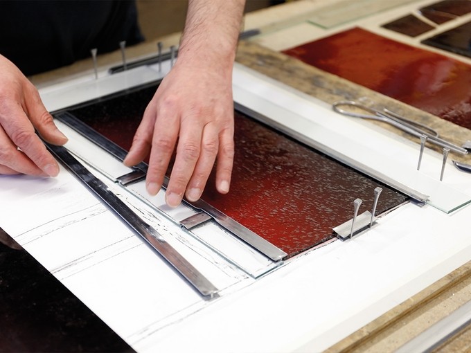 Student working on a glass project